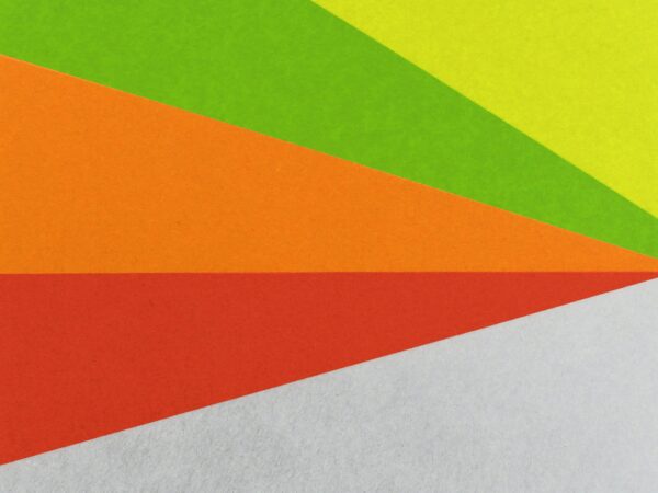 Vibrant geometric design with layered paper in bright colors, perfect for backgrounds.